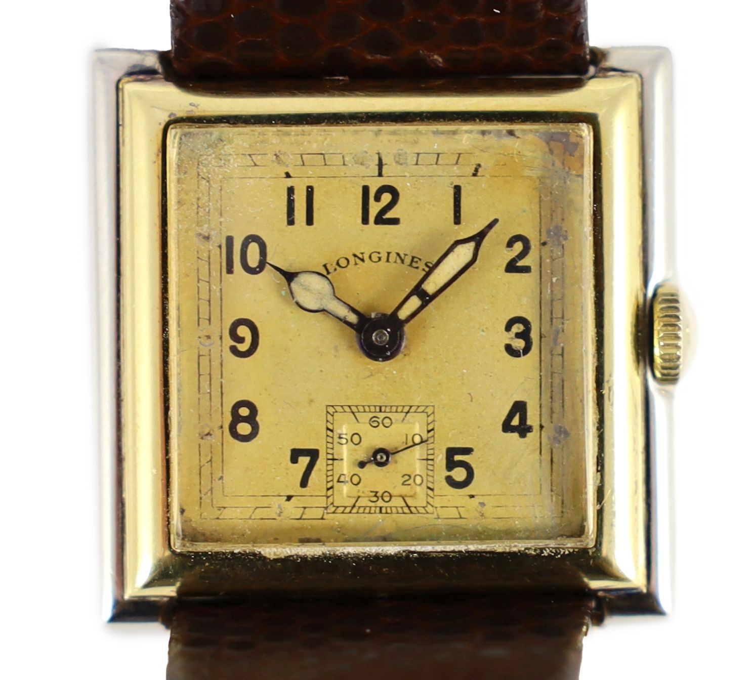 An Art Deco 18ct gold and platinum Longines manual wind square dial wrist watch